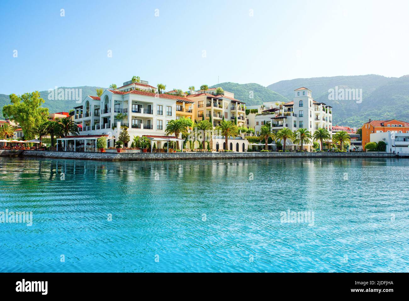 Sunset view of the yacht marina in Porto Montenegro with waterfront