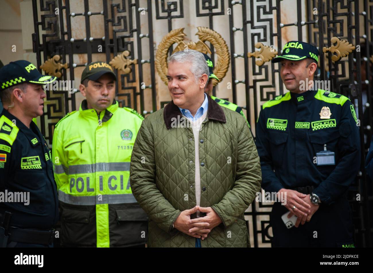 Colombian President Ivan Duque Marquez speaks with Colombian police officers during the voting rally for the presidential runoffs between left-wing Gu Stock Photo