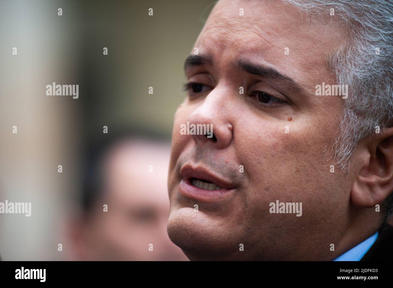 Colombian President Ivan Duque Marquez speaks to the media during the voting rally for the presidential runoffs between left-wing Gustavo Petro and In Stock Photo