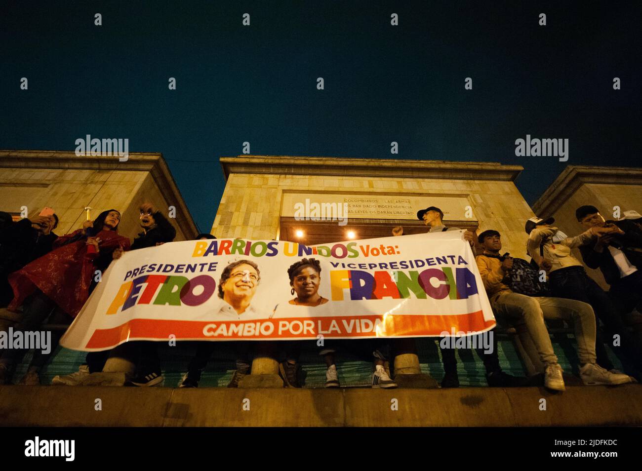 People celebrate in the streets and in Bogota's Plaza de Bolivar with campaign banners, shirts and signs, the victory of Gustavo Petro who won the sec Stock Photo