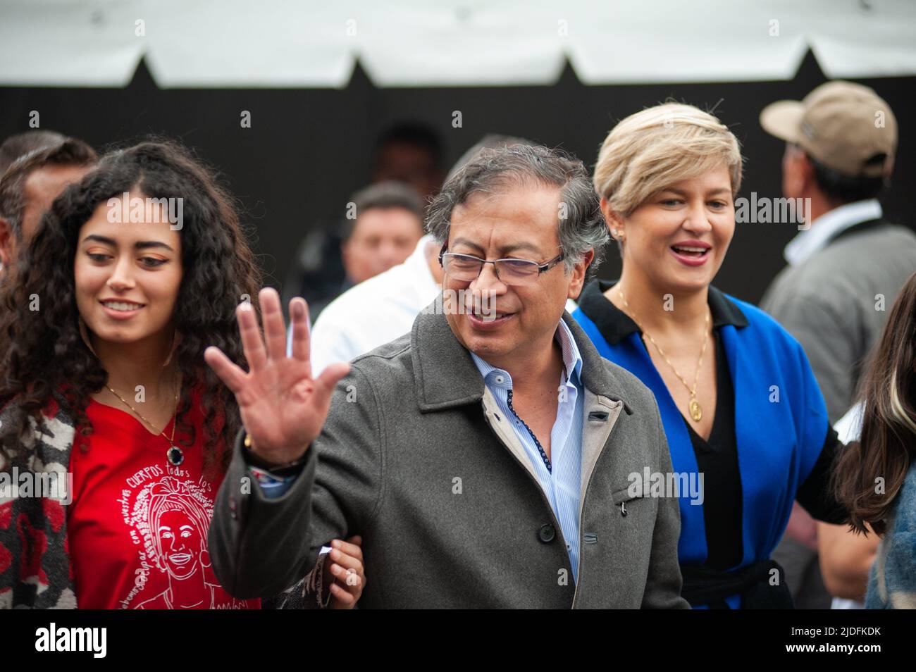 Left-wing presidential Candidate Gustavo Petro is followed by his family to vote during the voting rally for the presidential runoffs between left-win Stock Photo