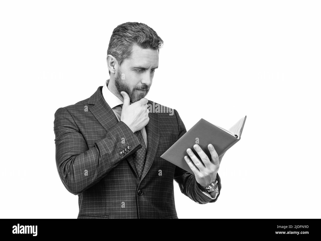 let me think. handsome man planning his work. boss examine business report Stock Photo