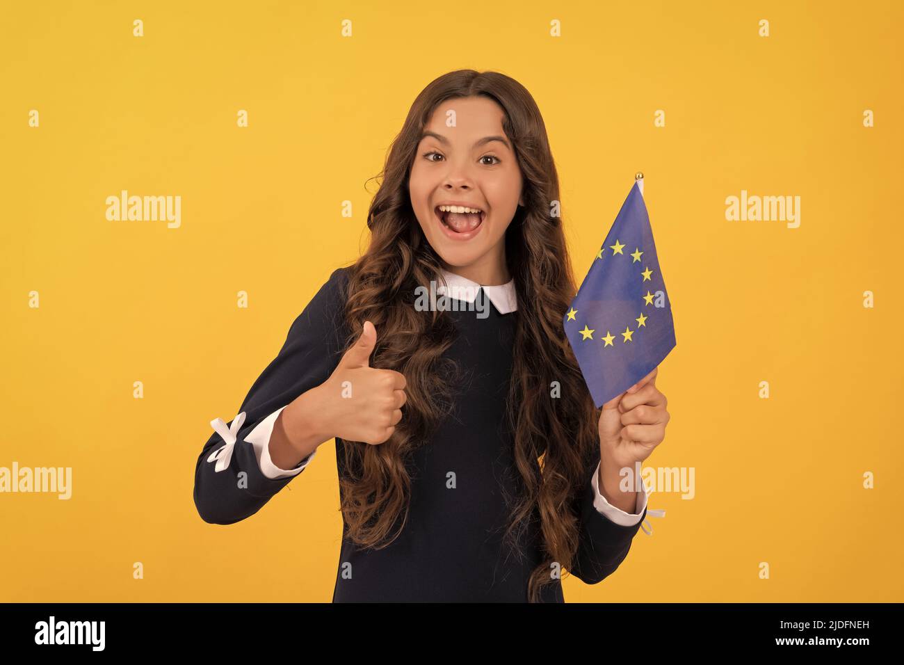 eurozone vacation. education in foreign school. thumb up. happy child Stock Photo