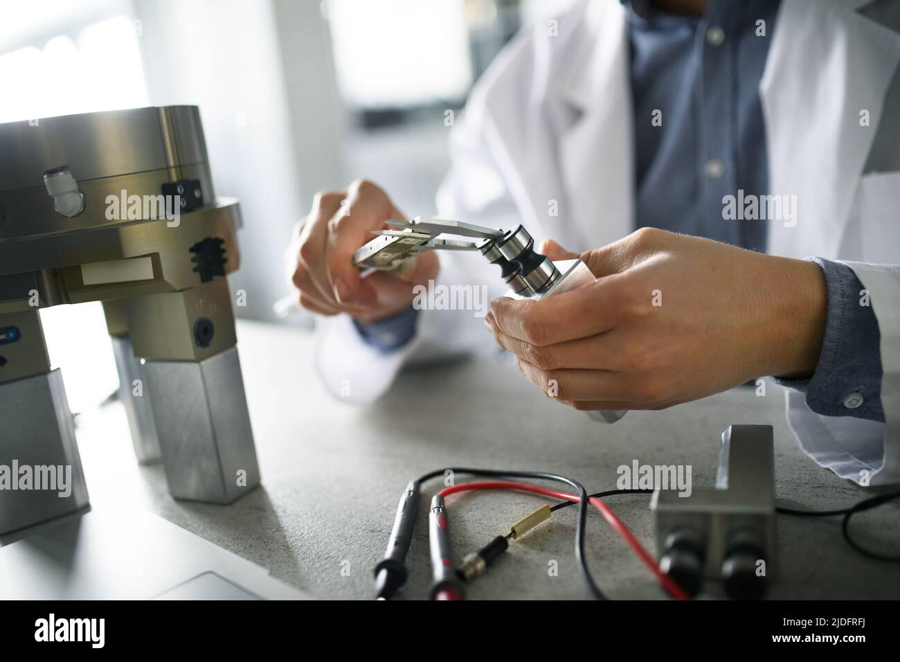 Close-up of engineer working in laboratory. Stock Photo