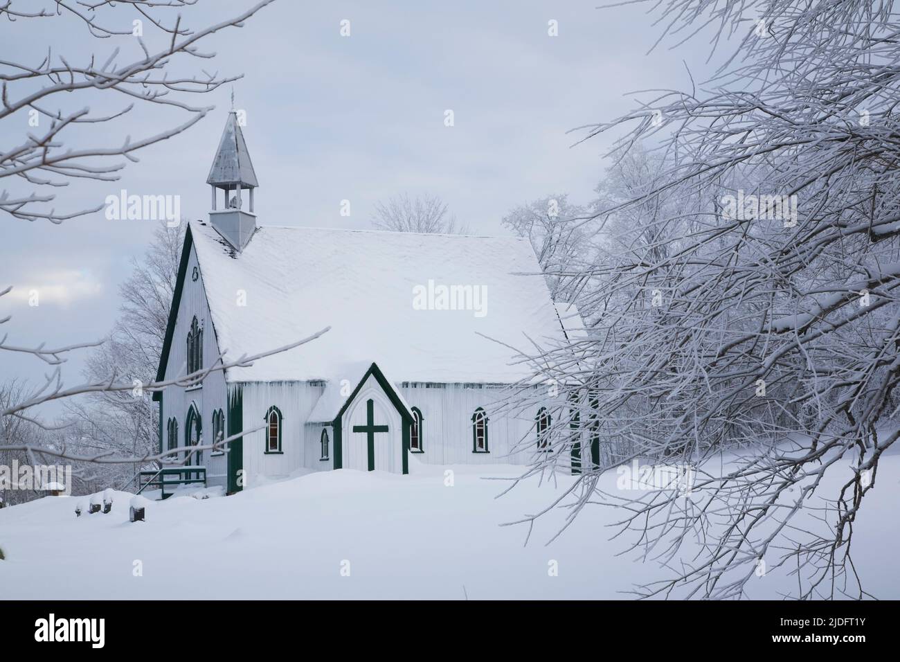 Holy Trinity Anglican church and cemetery in winter, Iron Hill, Eastern