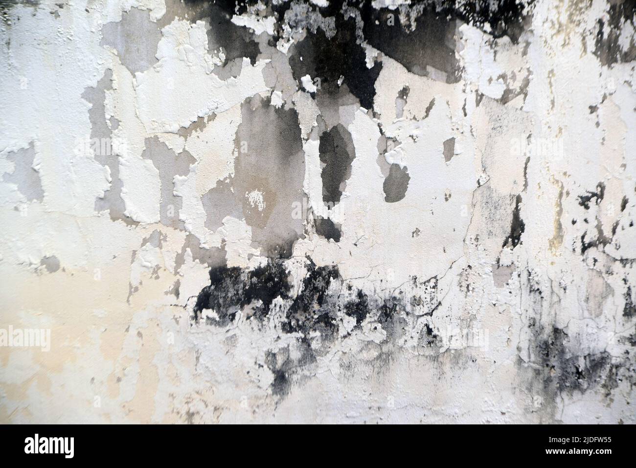 Texture and background of water stains on the cement building wall