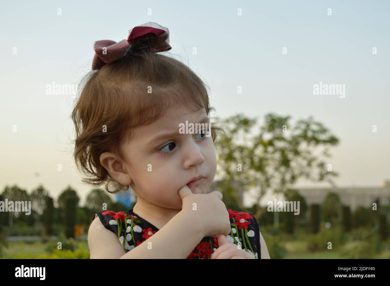 Cute South Asian Baby Girl in a Good Mood Stock Photo