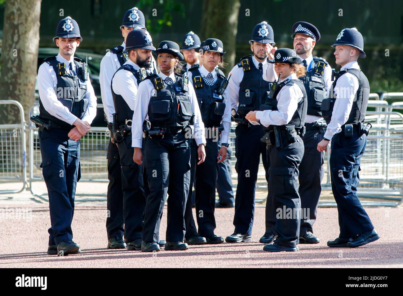 Police officers in a group at the Trooping the Colour Rehearsals, The Mall, London England, United Kingdom, Saturday, May 21, 2022. Stock Photo