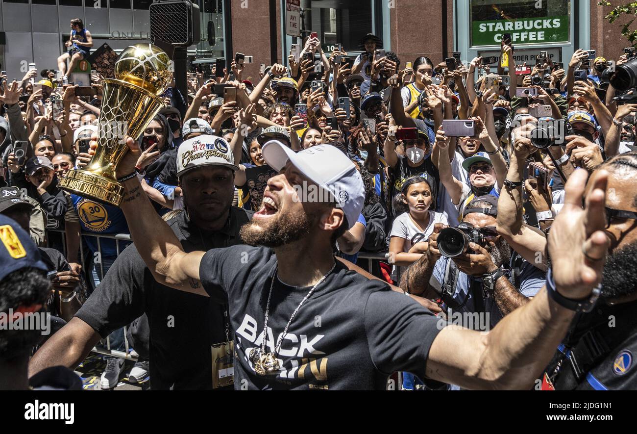 San Francisco, United States. 20th June, 2022. Golden State Warriors Stephen Curry takes the NBA Finals MVP trophy out to the fans during a parade up Market Street to honor the team's NBA championship in San Francisco on Monday, June 20, 2022. Photo by Terry Schmitt/UPI Credit: UPI/Alamy Live News Stock Photo