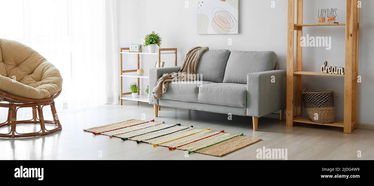 Interior of living room with comfortable couch Stock Photo - Alamy