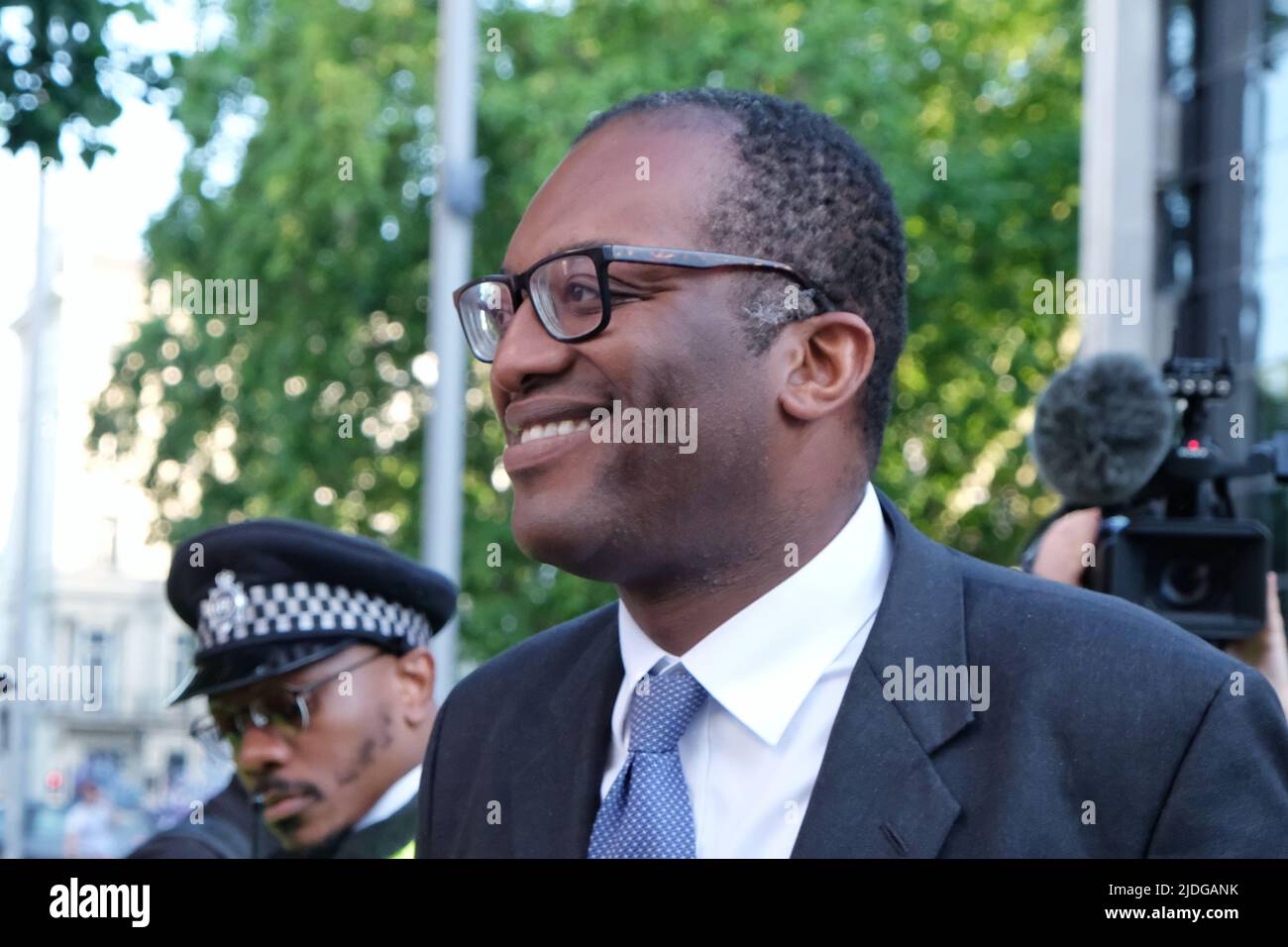 London, UK, 20th June, 2022. Secretary of State for Business and Energy Kwasi Kwarteng arrives for the Conservative Summer Party as culture sector workers from the Public and Commercial Services (PCS) union stage a pay protest outside the Victoria and Albert Museum, where the event was due to take place. Museum workers have been offered a 2% pay increase, though deemed inadequate as the Bank of England has predicted inflation will run at 11% by October. The annual event was attended by Cabinet ministers, MPs and Conservative Party donors. Credit: Eleventh Hour Photography/Alamy Live News Stock Photo