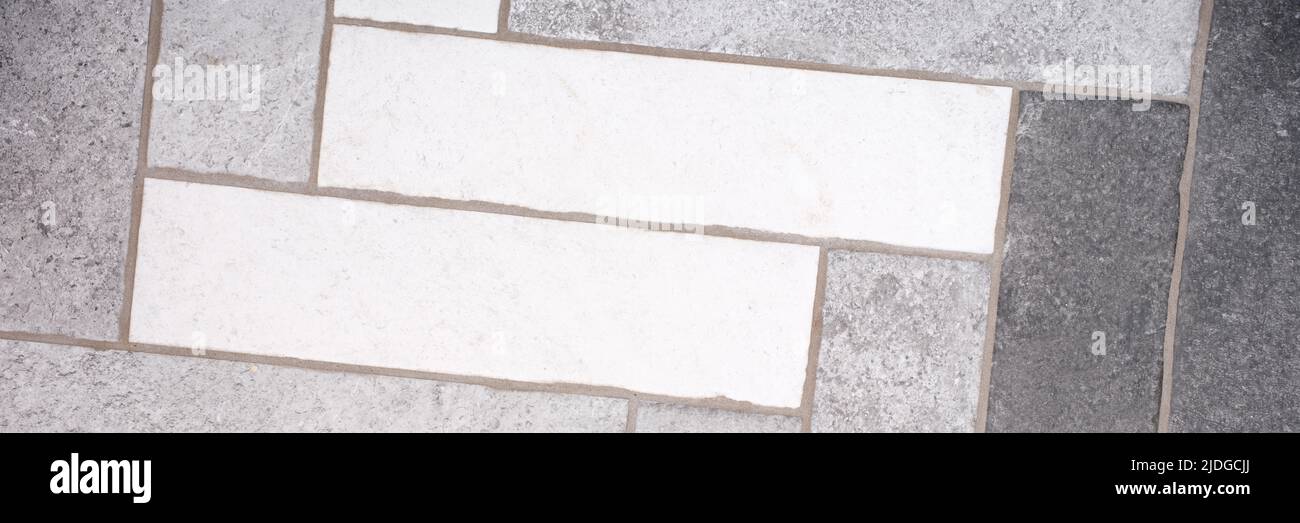 Rectangular floor tiles in white and gray tones Stock Photo