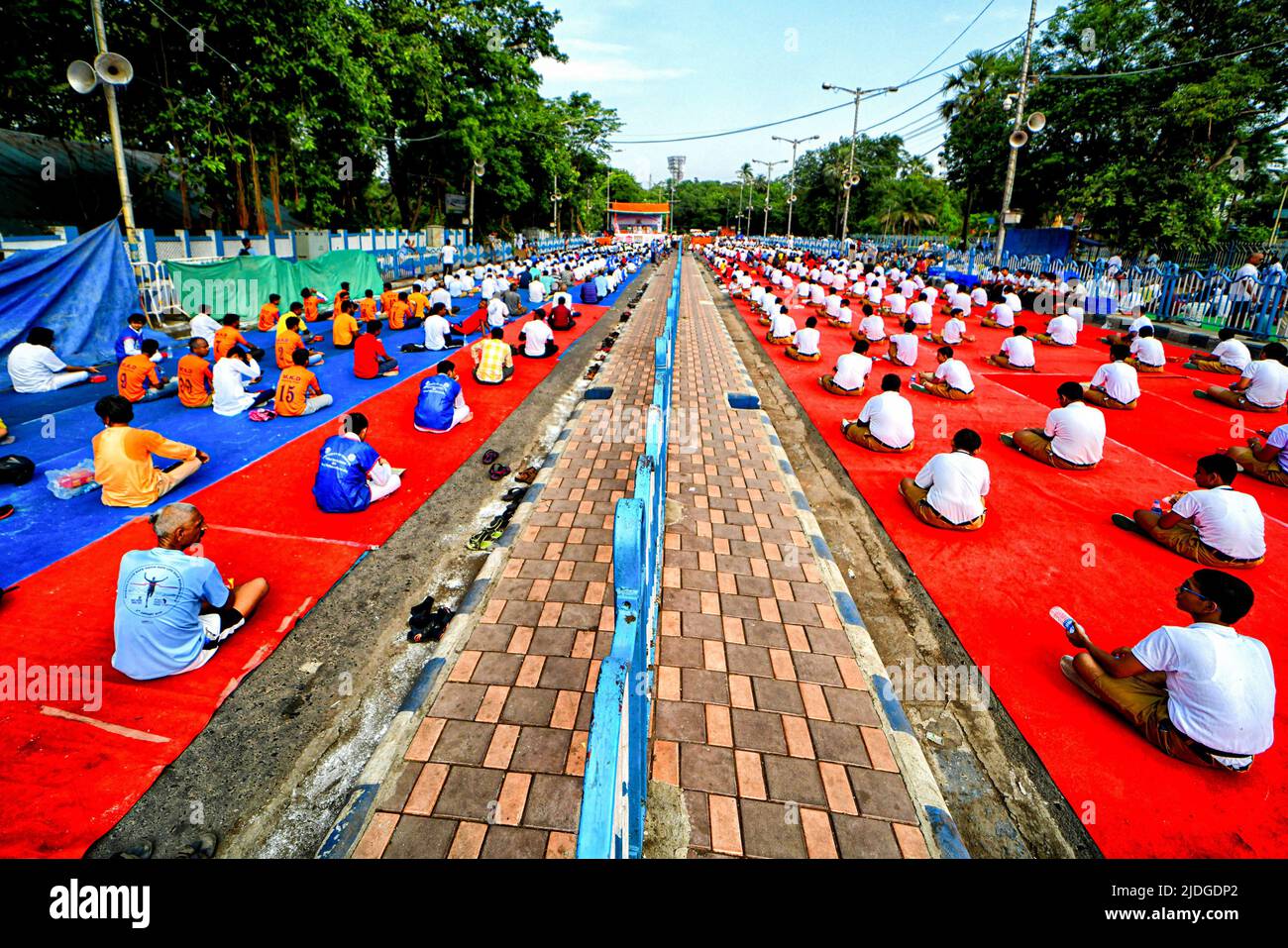 Kolkata, India. 21st June, 2022. People seen practicing Padmasama (A form of Yoga) during the International Yoga Day in Kolkata organized by Kreeda bharati . Yoga is a Physical and Spiritual practice originated from India during the Ancient ages and its now recognized by United Nations. International YOGA DAY has been celebrated annually on June 21 since 2015, following its inception in the United Nations General Assembly in 2014. (Photo by Avishek Das/SOPA Images/Sipa USA) Credit: Sipa USA/Alamy Live News Stock Photo