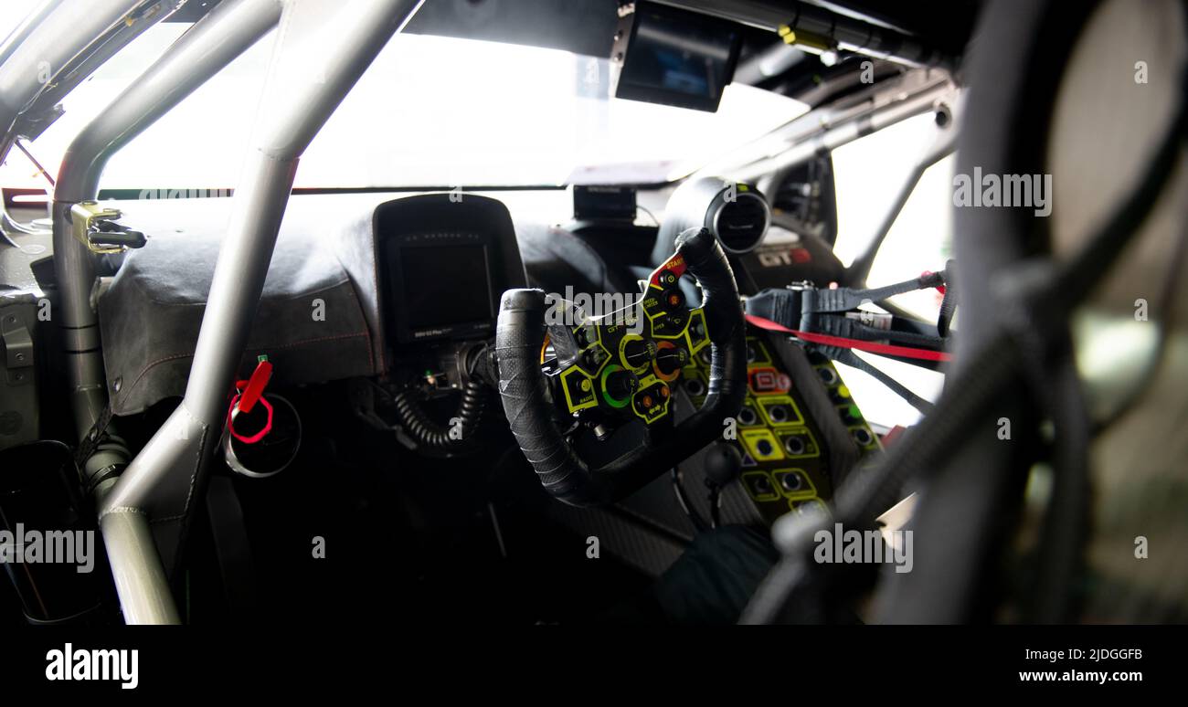 Car racing steering wheel in Lamborghini Huracan GT car cockpit detail no people Stock Photo