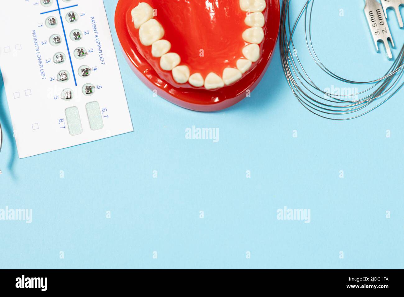 a set of special tools for an orthodontist to install braces for a