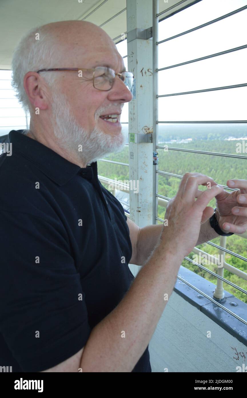 Berlin, Germany - June 19, 2022 - Land surveyor Hans-Gerd Becker at the top of Mueggelberg tower in Koepenick locality. (Photo by Markku Rainer Peltonen) Stock Photo