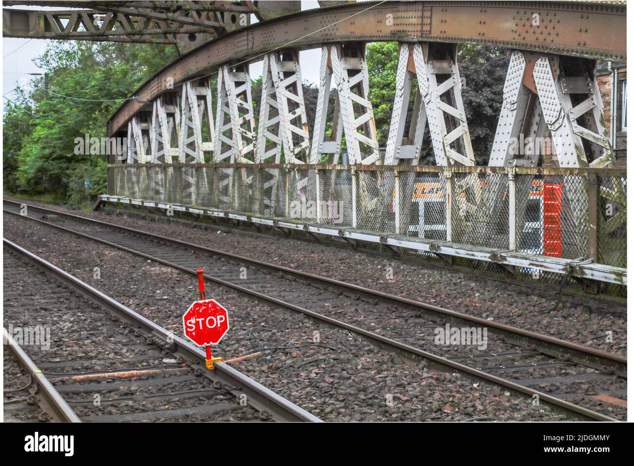A deserted Glasgow train station platform at peak travelling time as