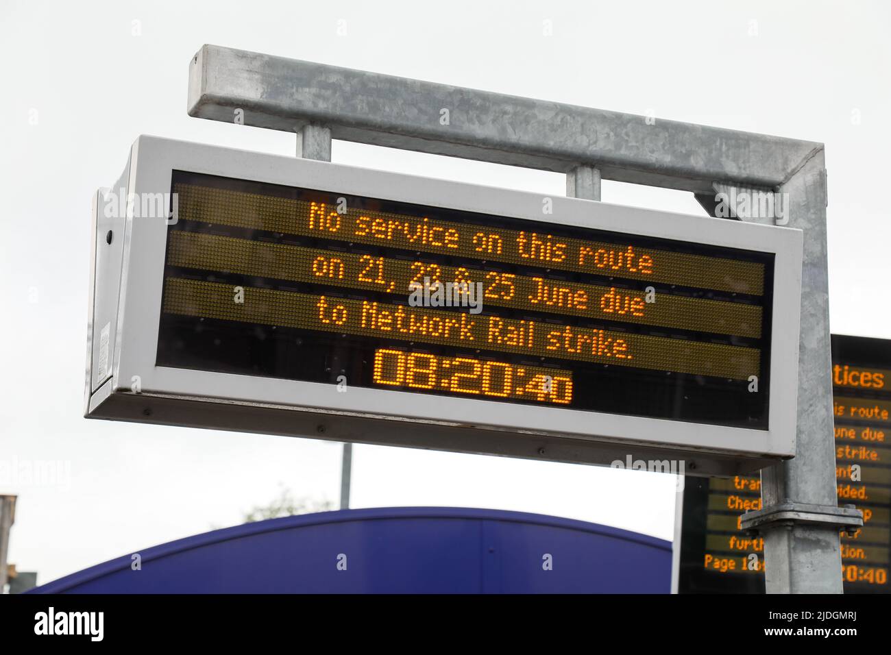 A deserted Glasgow train station platform at peak travelling time as