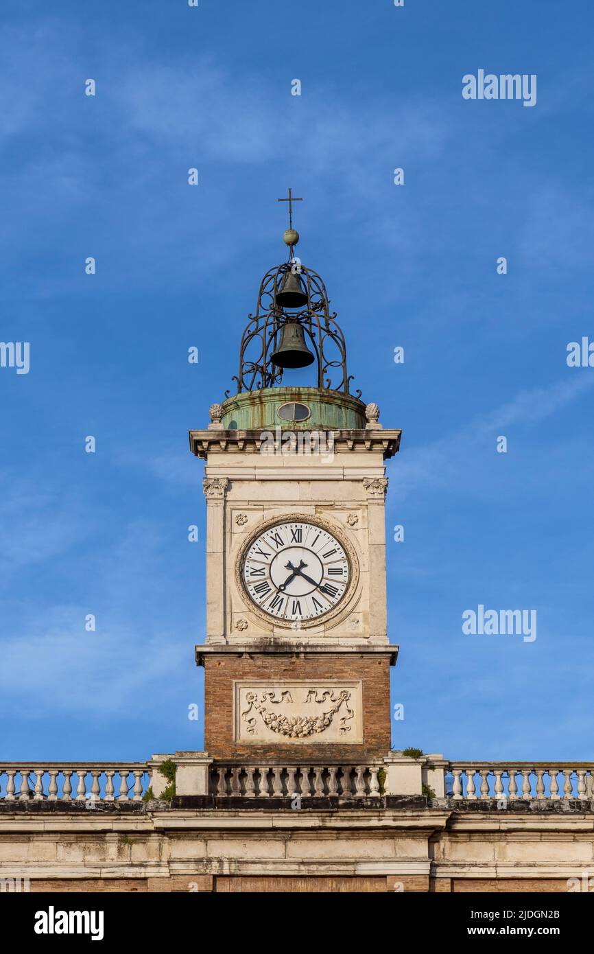 Old bell and clock tower in Piazza Del Popolo Square. Ravenna, Emilia Romagna, Italy, Europe, European Union, EU. Blue sky, copy space. Stock Photo