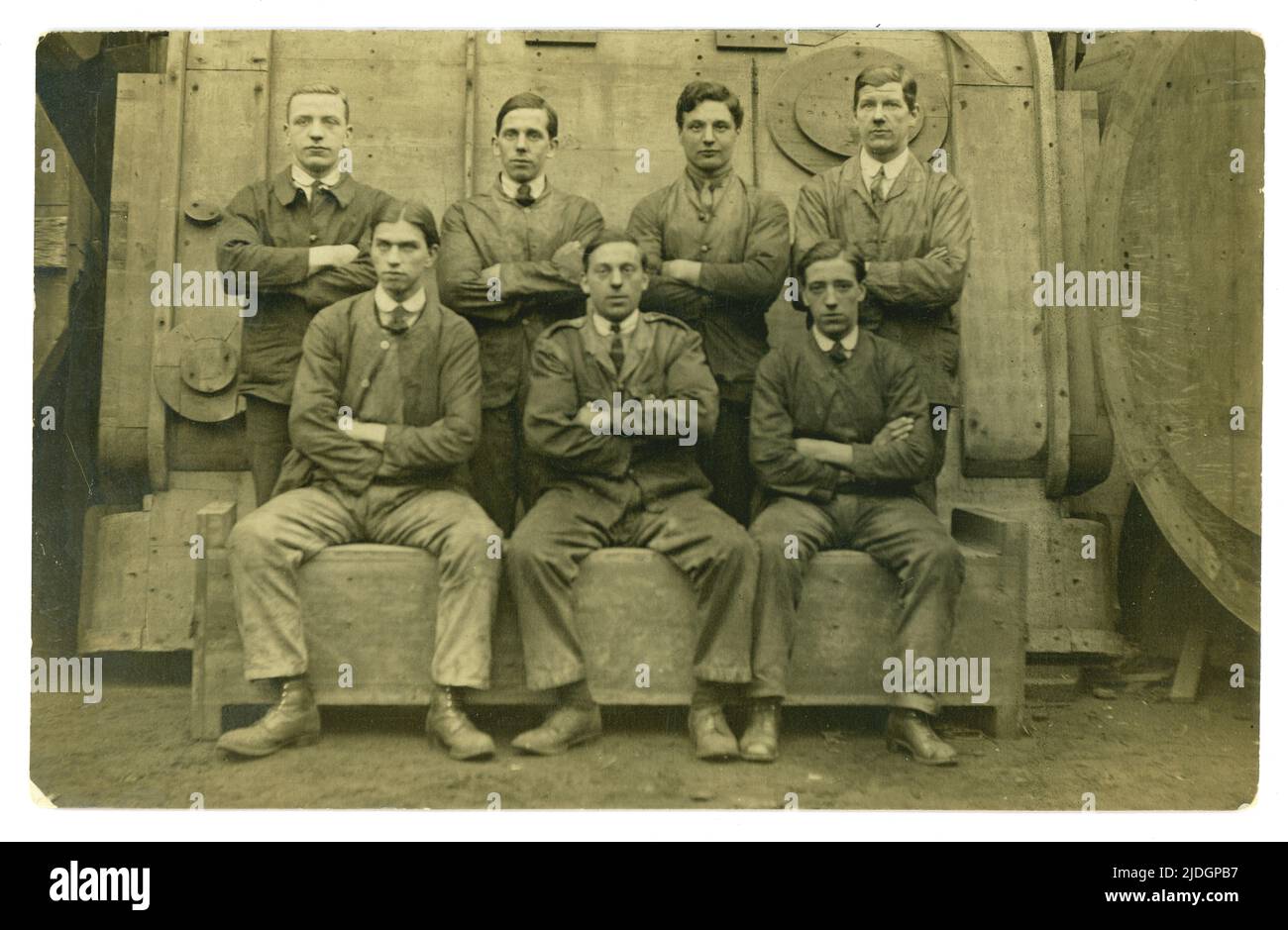 Original and rare postcard of a group of proud looking British working class men at work at a specialist iron foundry pattern makers, using wood, to possibly manufacture locomotives, heavy industrial use, possibly during WW1 - doing their bit for the war effort. Circa 1914-1919, Hulme, Manchester, U.K. Stock Photo