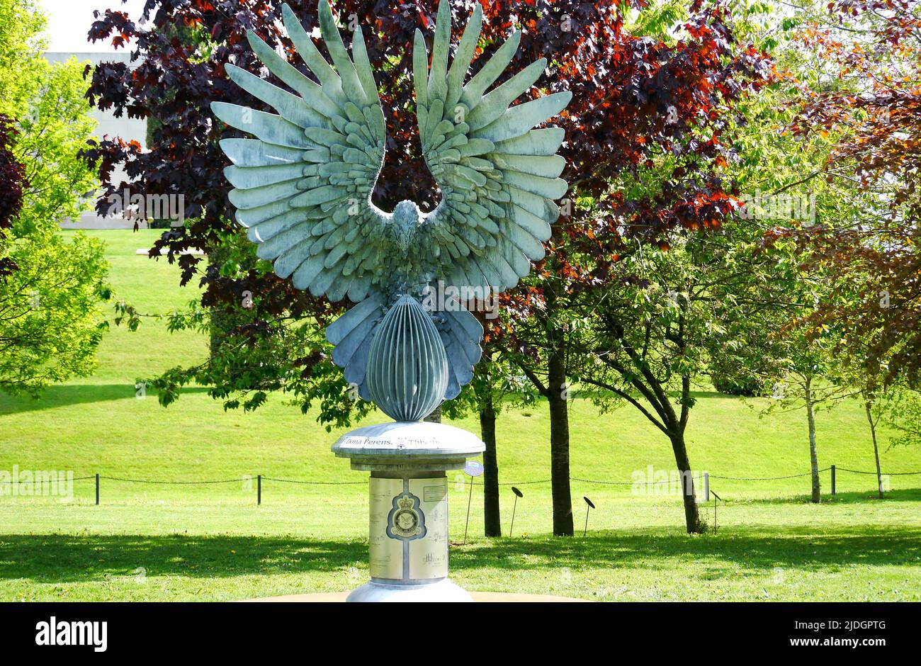 Stone Eagle Statue Bearing Gifts Memorial Dedicated to 216 Squadron (Royal Air Force) at the National Memorial Arboretum, Staffordshire, England, UK. Stock Photo