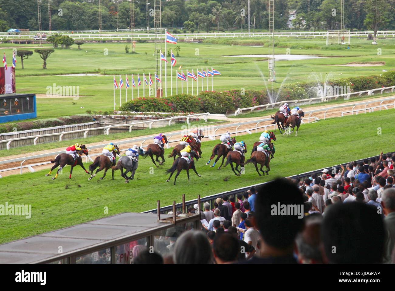 Bangkok, Thailand - July 29 2012: Horse racing at the Royal Bangkok Sports Club (RBSC), an exclusive sports club founded in 1901. Stock Photo