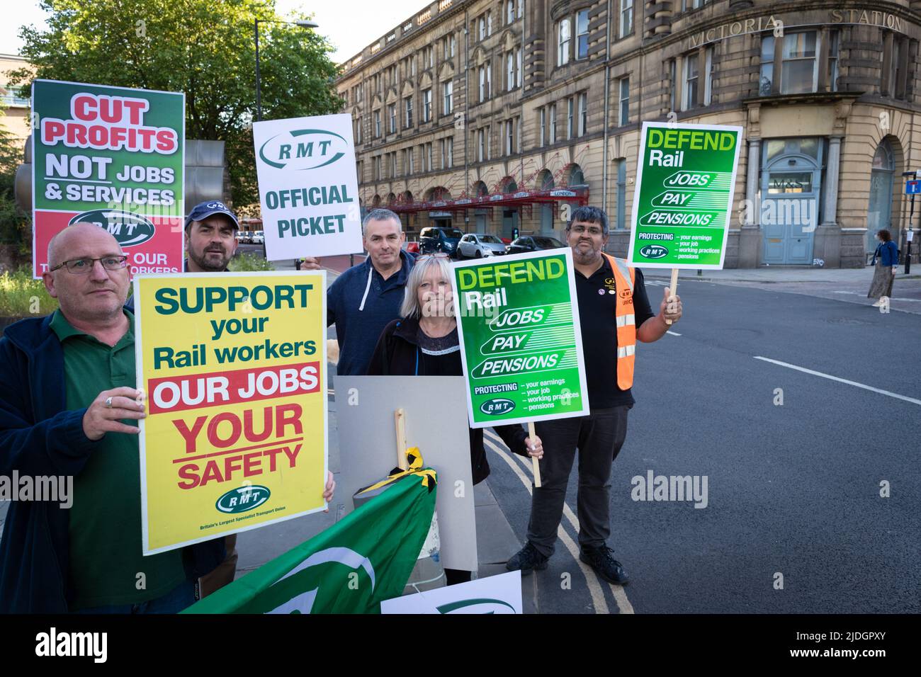 Manchester, UK. 21st June, 2022. Union members and rail workers join the picket line at Victoria train station. The biggest rail strike in over 30 years went ahead after last-minute talks failed. RMT states it has no choice but to strike due to proposed cuts to jobs, pay and pensions. Credit: Andy Barton/Alamy Live News Stock Photo