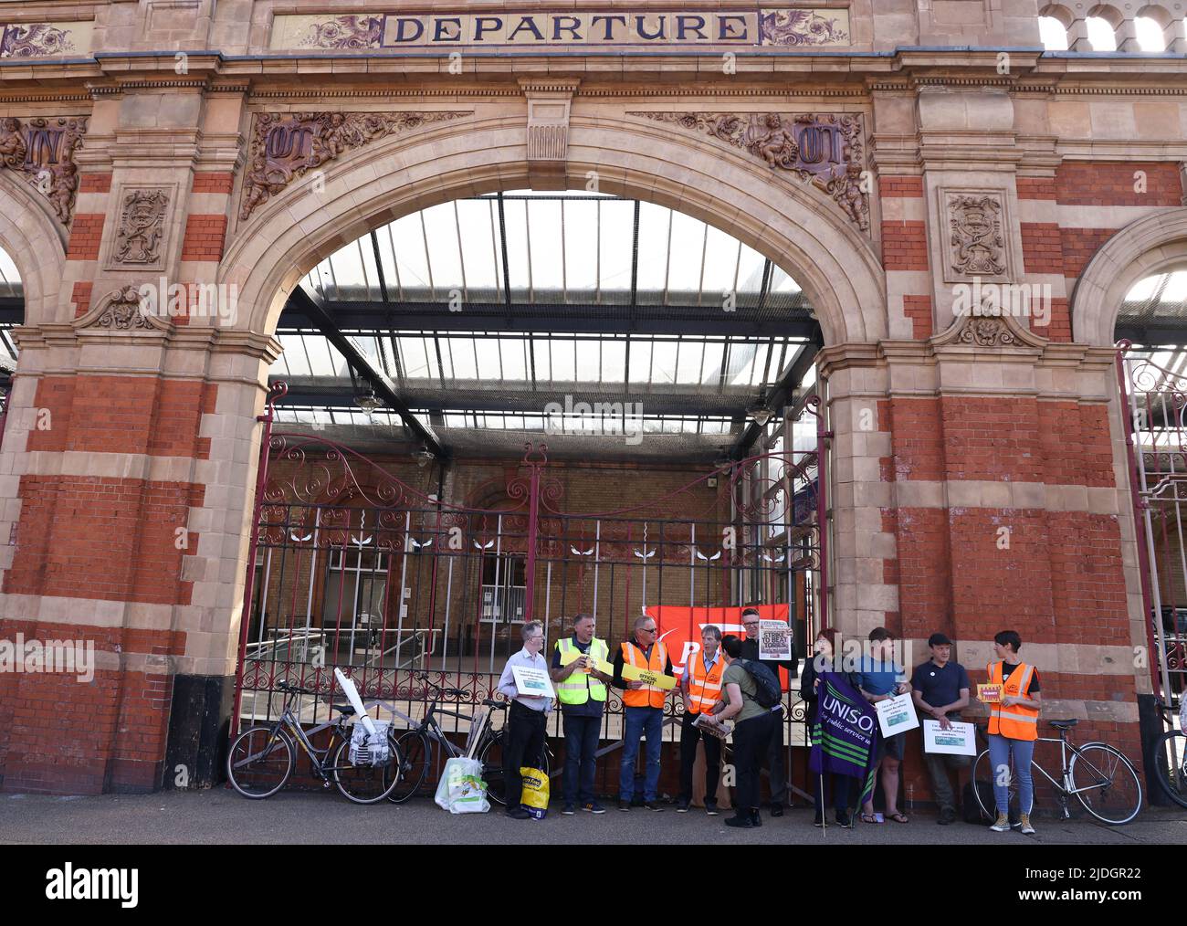 Leicester, Leicestershire, UK. 21st June 2022. Rail workers stand on a picket line as they stage the first of three national strikes. The RMT called the strikes over job cuts, pay and conditions. Credit Darren Staples/Alamy Live News. Stock Photo