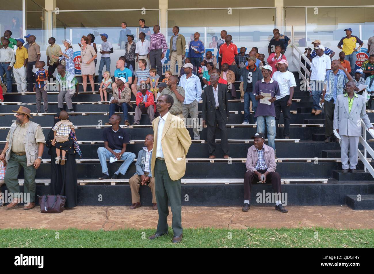 Spectators watching a horses race, Ngong Racecourse, Ngong Road, Nairobi, Kenya.  1 Mar 2015 Stock Photo
