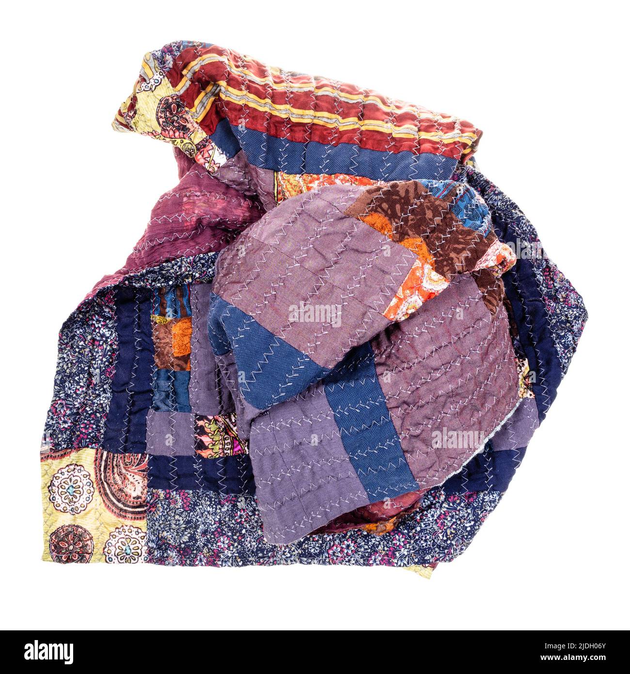 crumpled handcrafted patchwork scarf from purple silk fabrics cutout on white background Stock Photo