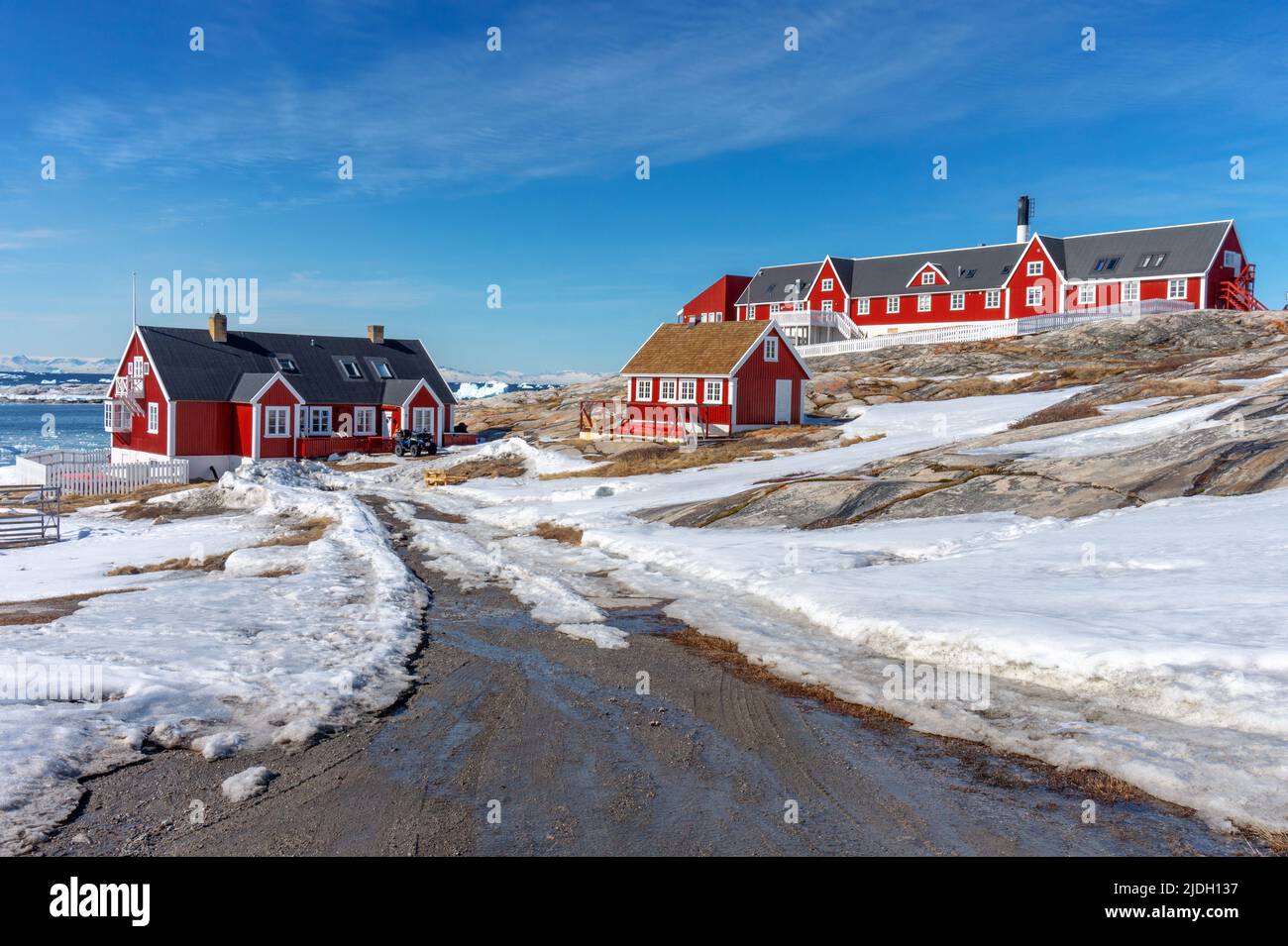 beautiful red houses cityscape in Ilulissat Greenland Stock Photo