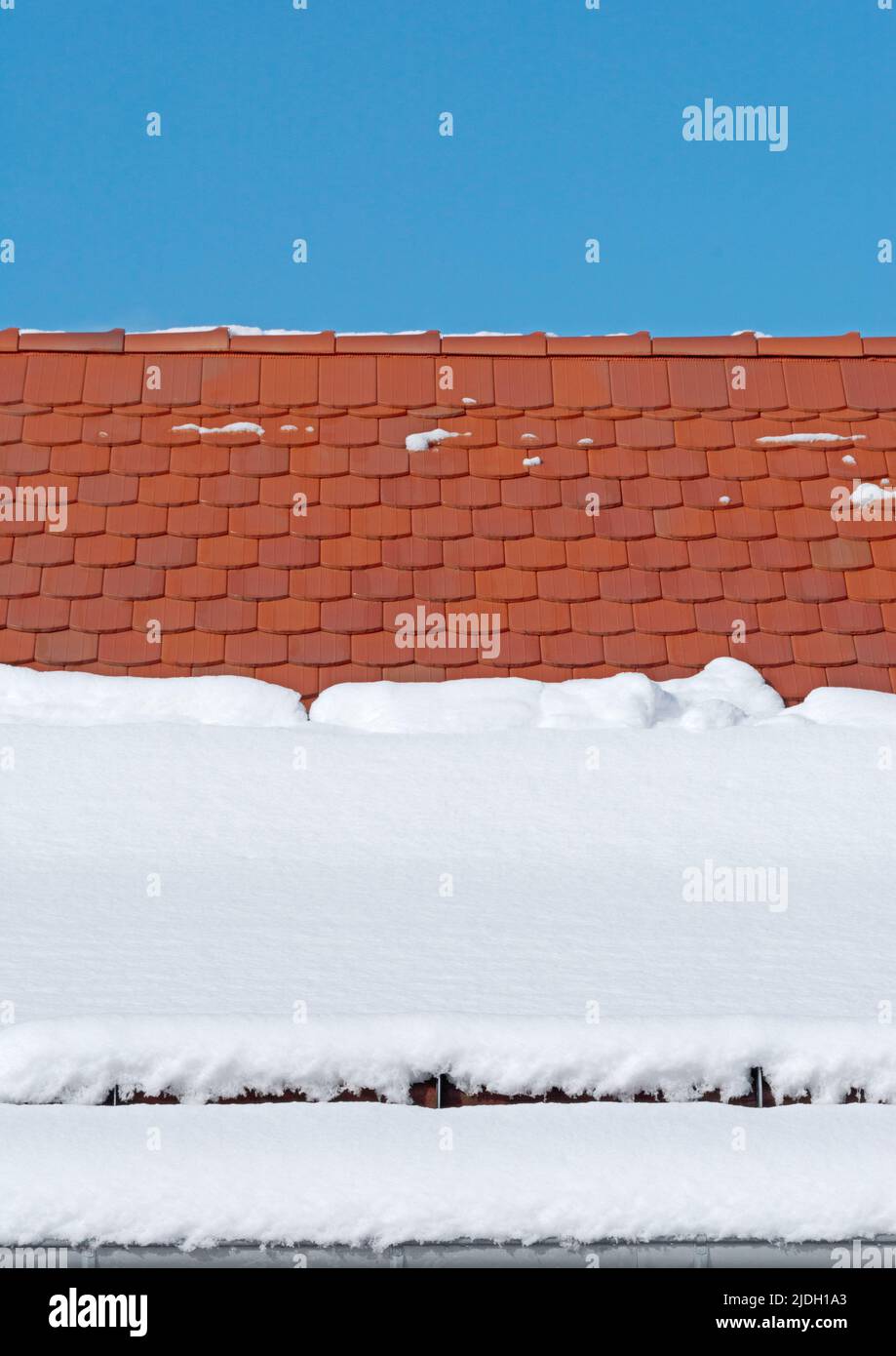 Roof with melting snow, portrait format Stock Photo