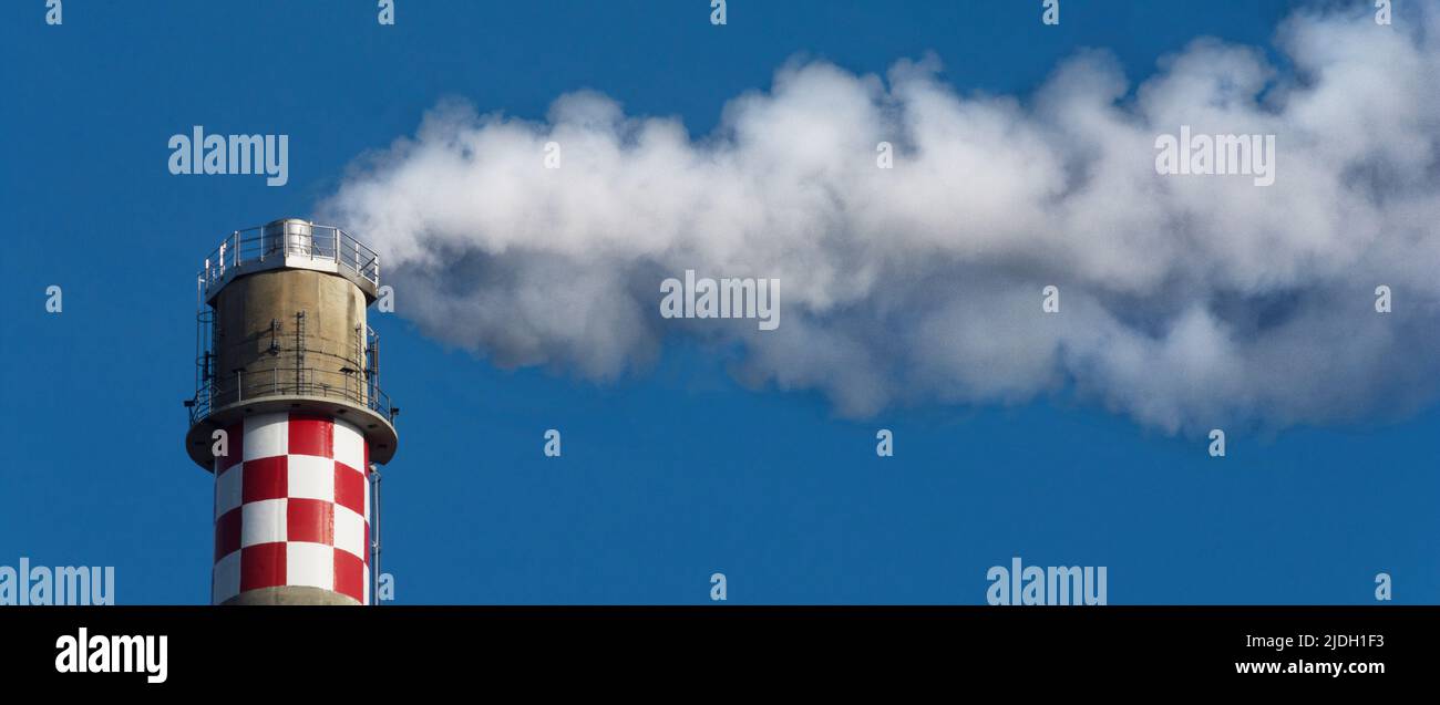 Industrial chimney emissions Stock Photo