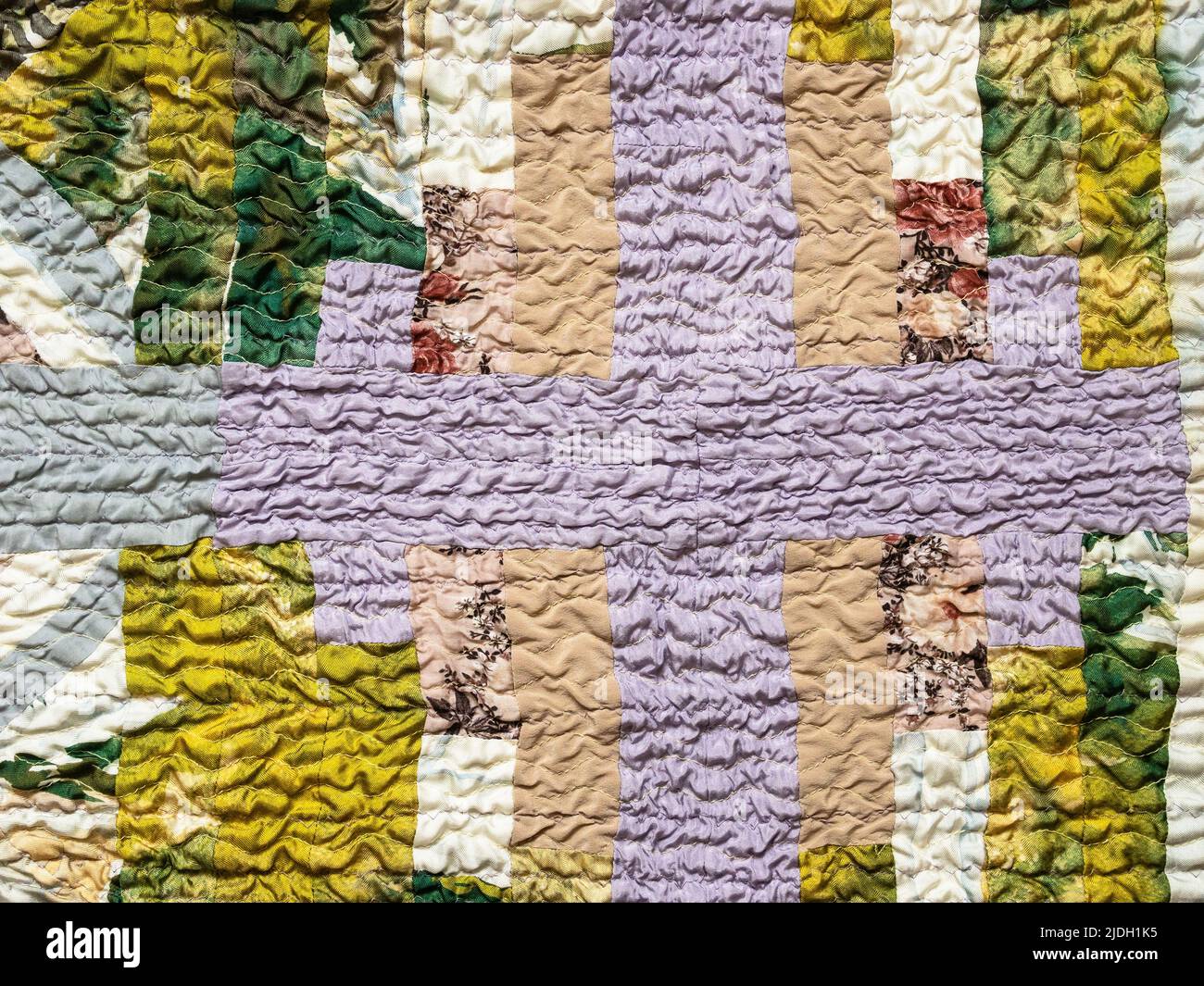 handcrafted pattern of crinkled patchwork sllk scarf close up Stock Photo