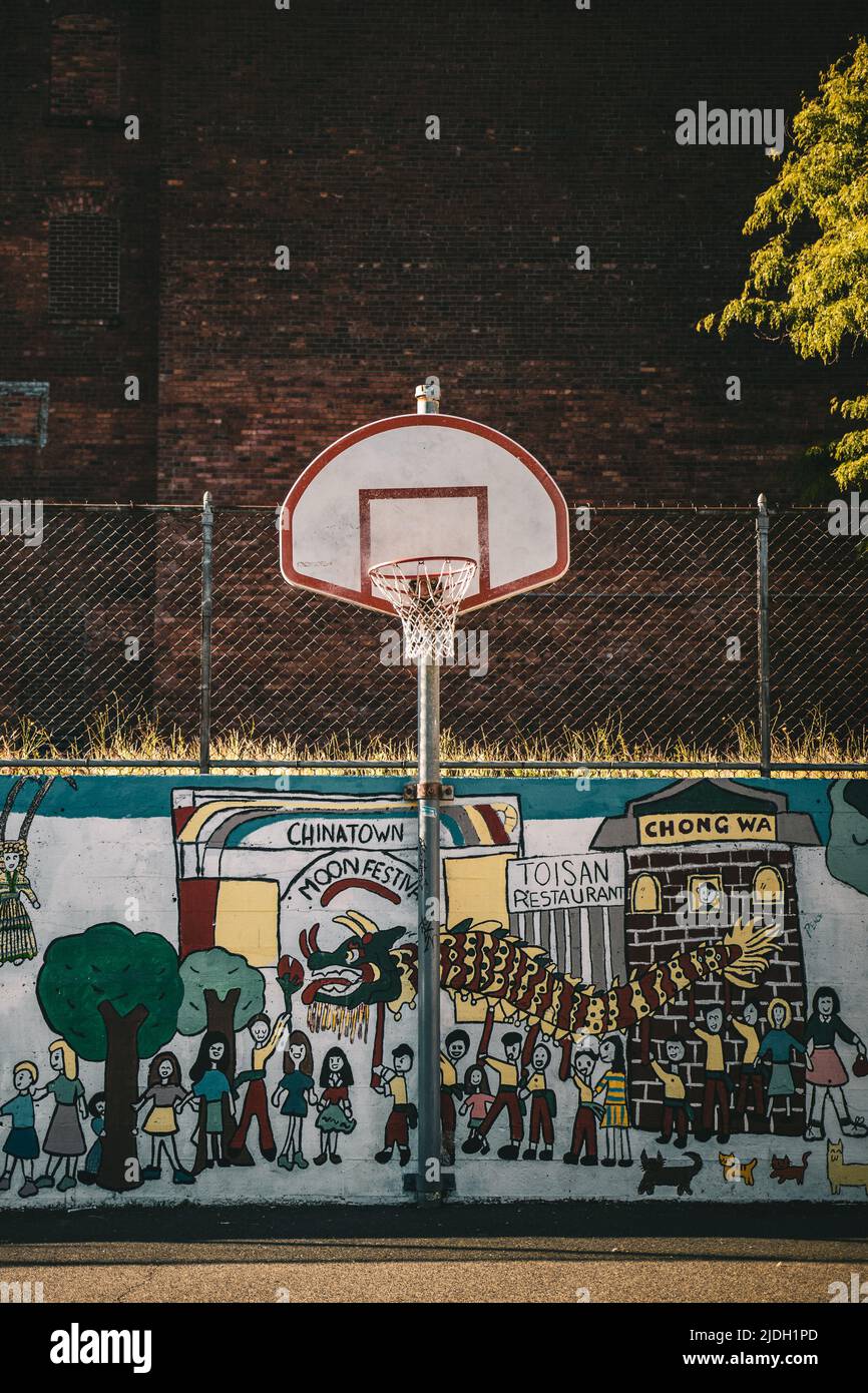 Basketball hoop at a park downtown Stock Photo Alamy
