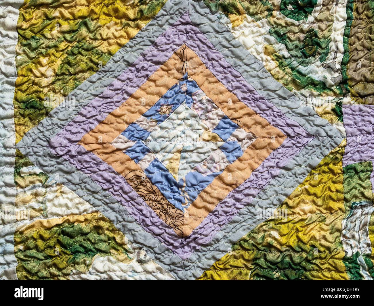 handcrafted geometric pattern of crinkled patchwork sllk scarf Stock Photo