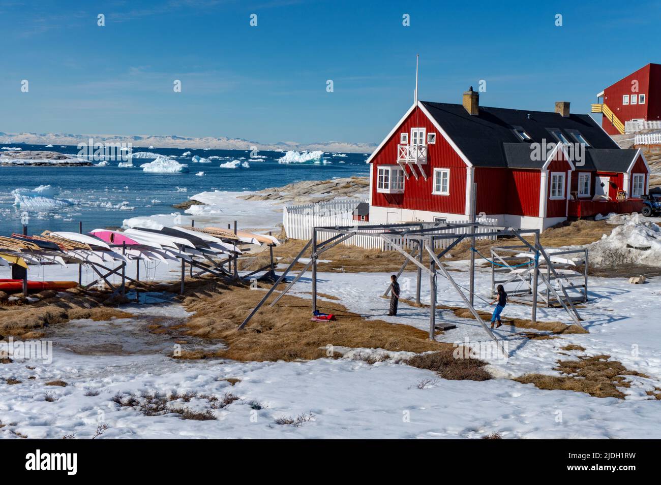beautiful red houses cityscape in Ilulissat Greenland Stock Photo