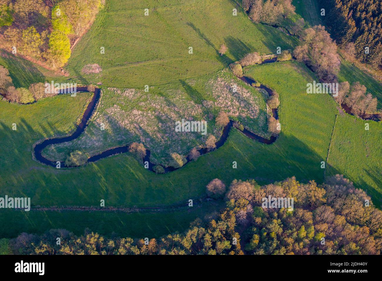 Bending river course of the Osterau, aerial view 05/06/2022, Germany, Schleswig-Holstein Stock Photo