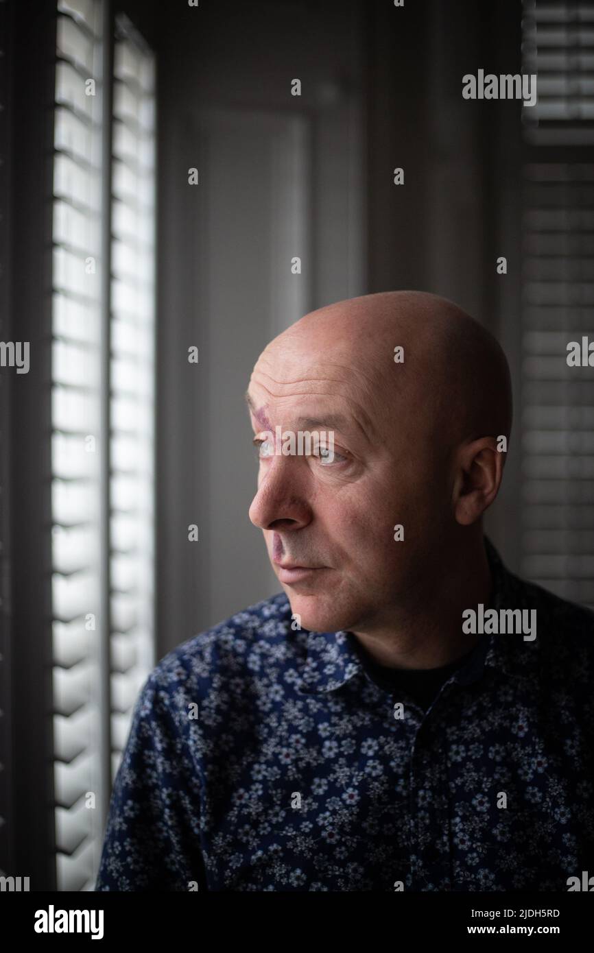 Christopher Brookmyre, author, in his home in Bothwell, Scotland, 2 March 2022. Stock Photo