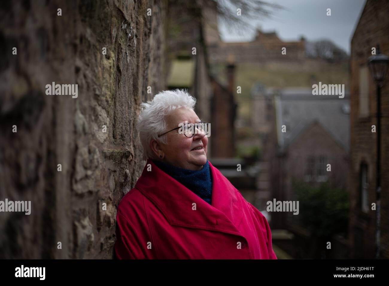Val McDermid, crime writer, photographed with a backdrop of Edinburgh Castle, in Edinburgh, Scotland, 3 March 2022. Stock Photo