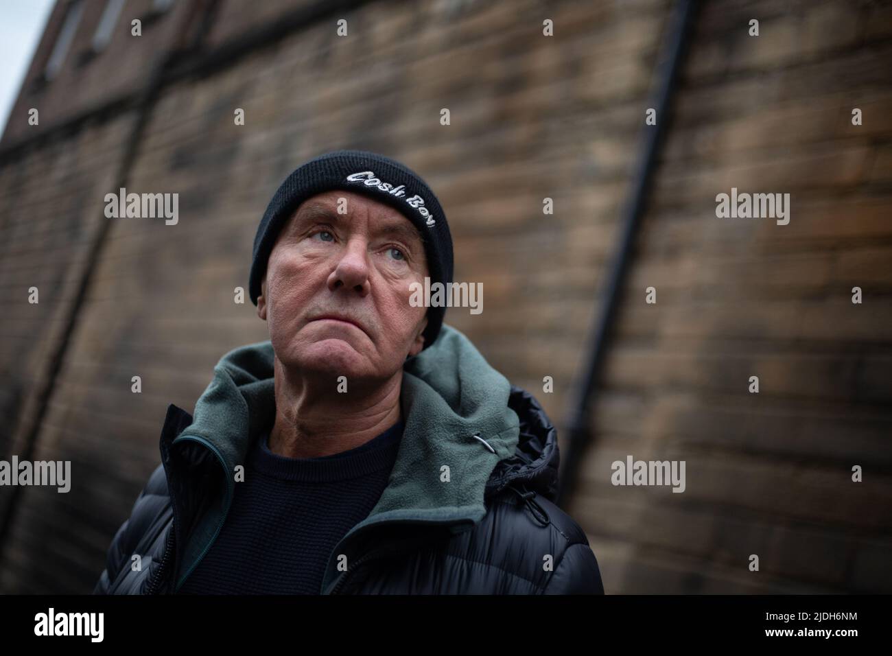 Irvine Welsh, author, in the new town area of  Edinburgh, Scotland, 2 March 2022. Stock Photo