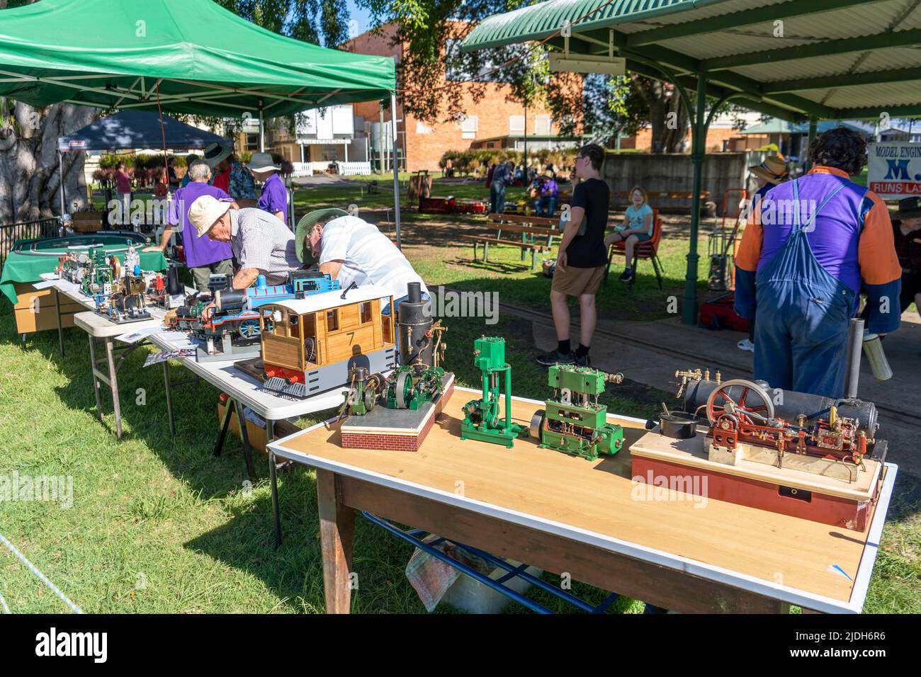 Model railway and steam engine enthusiasts displaying scale models