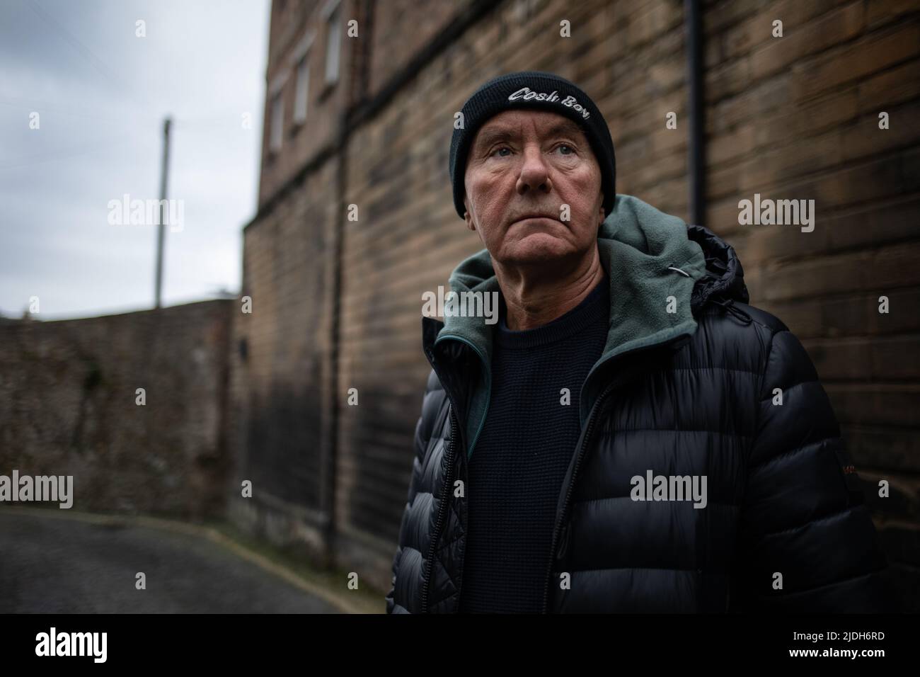Irvine Welsh, author, in the new town area of  Edinburgh, Scotland, 2 March 2022. Stock Photo