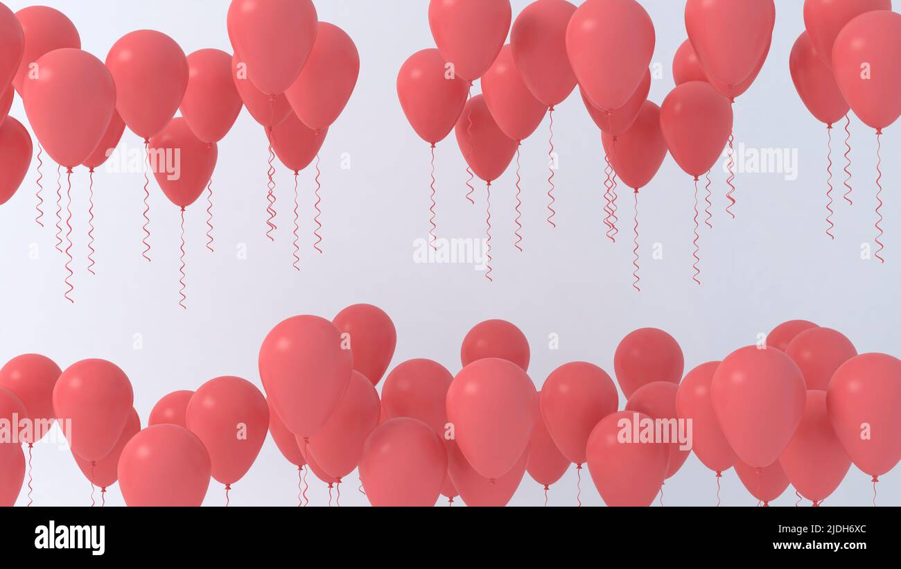 Red helium balloons on blue grey background with copy space Stock Photo