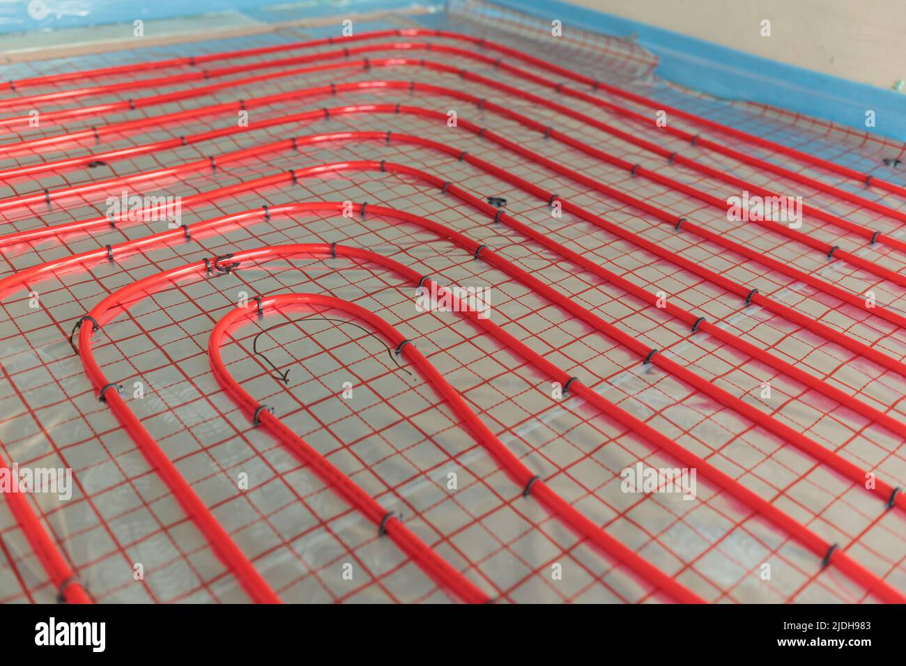 Underfloor surface heating pipes. Low temperature heating Stock Photo
