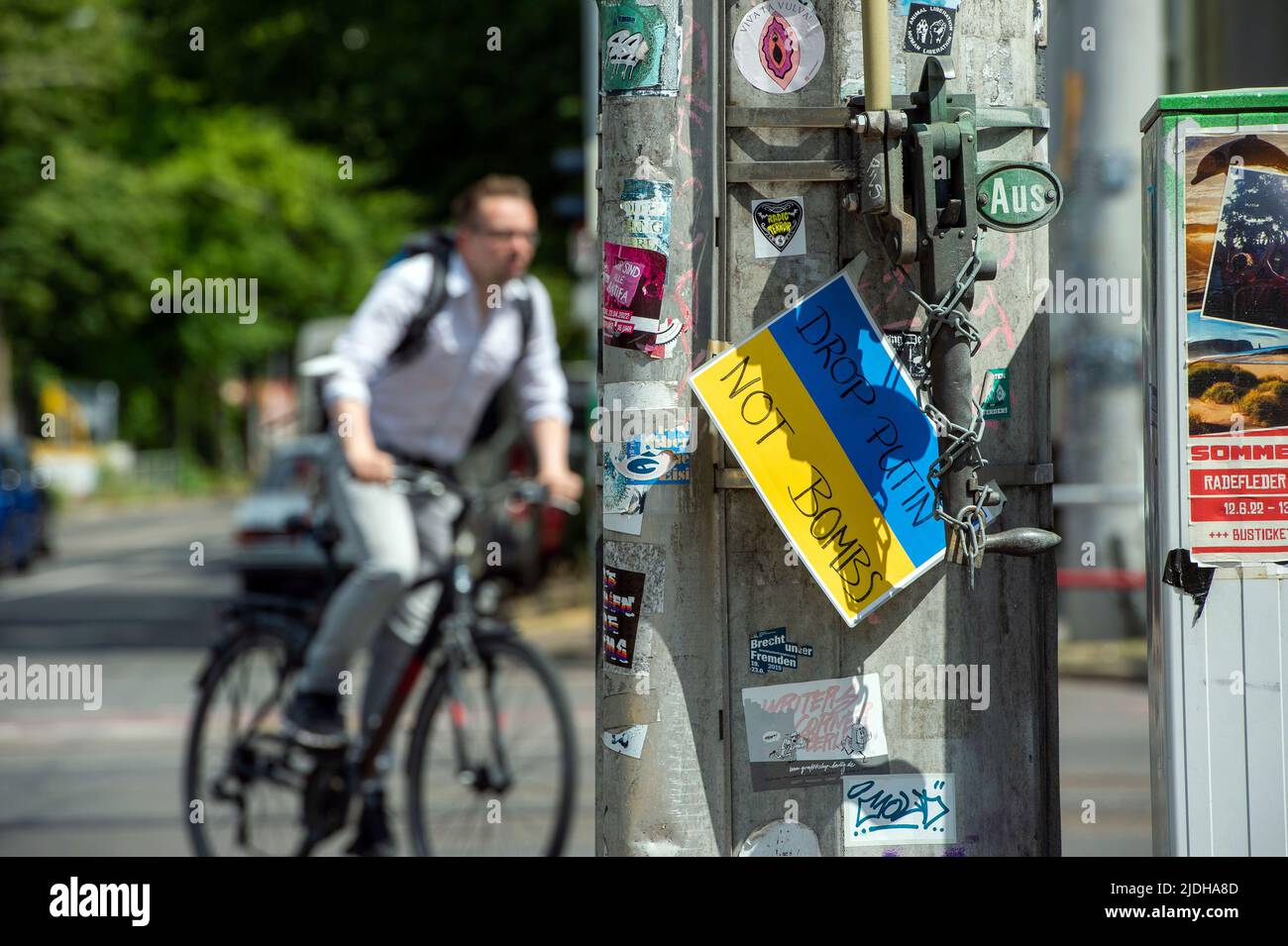 Anti War in Ukraine poster on a streetlamp at Connewitz Cross in Leipzig, Saxony, Germany. Stock Photo