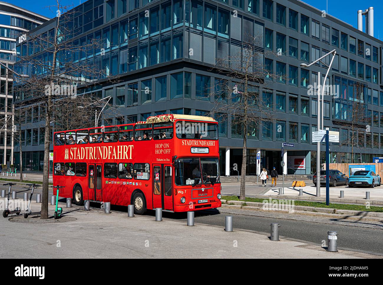 Red Hop On Hop Off Sightseeing Bus In Downtown Hamburg Stock Photo
