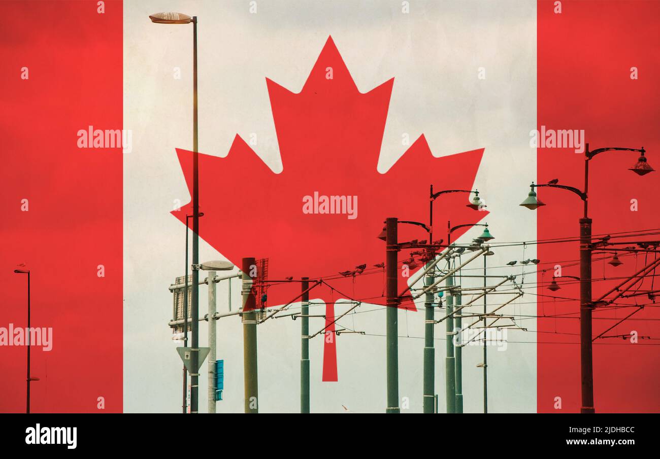 Canada flag with tram connecting on electric line with blue sky as