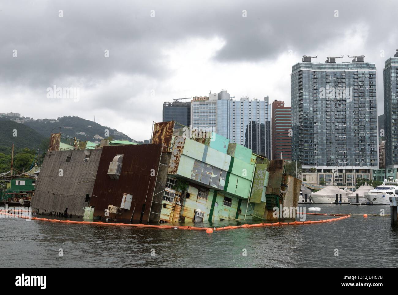 June 21, 2022, Hong Kong, Hong Kong SAR, China: Hong Kong, China:21 Jun, 2022. The Jumbo Floating restaurant capsized in the South China Sea while being towed to an undisclosed destination for repairs. Parts os the kitchen remain while one has listed.Jumbo Kingdom çå¯¶çŽ‹åœ‹ consisted of the Jumbo Floating Restaurant çå¯¶æµ·é®®èˆ«) and the adjacent Tai Pak Floating Restaurant å¤ªç™½æµ·é®®èˆ« which were renowned tourist attractions in Aberdeen South Typhoon Shelter, within Hong Kong's Aberdeen Harbour. (Credit Image: © Jayne Russell/ZUMA Press Wire) Stock Photo