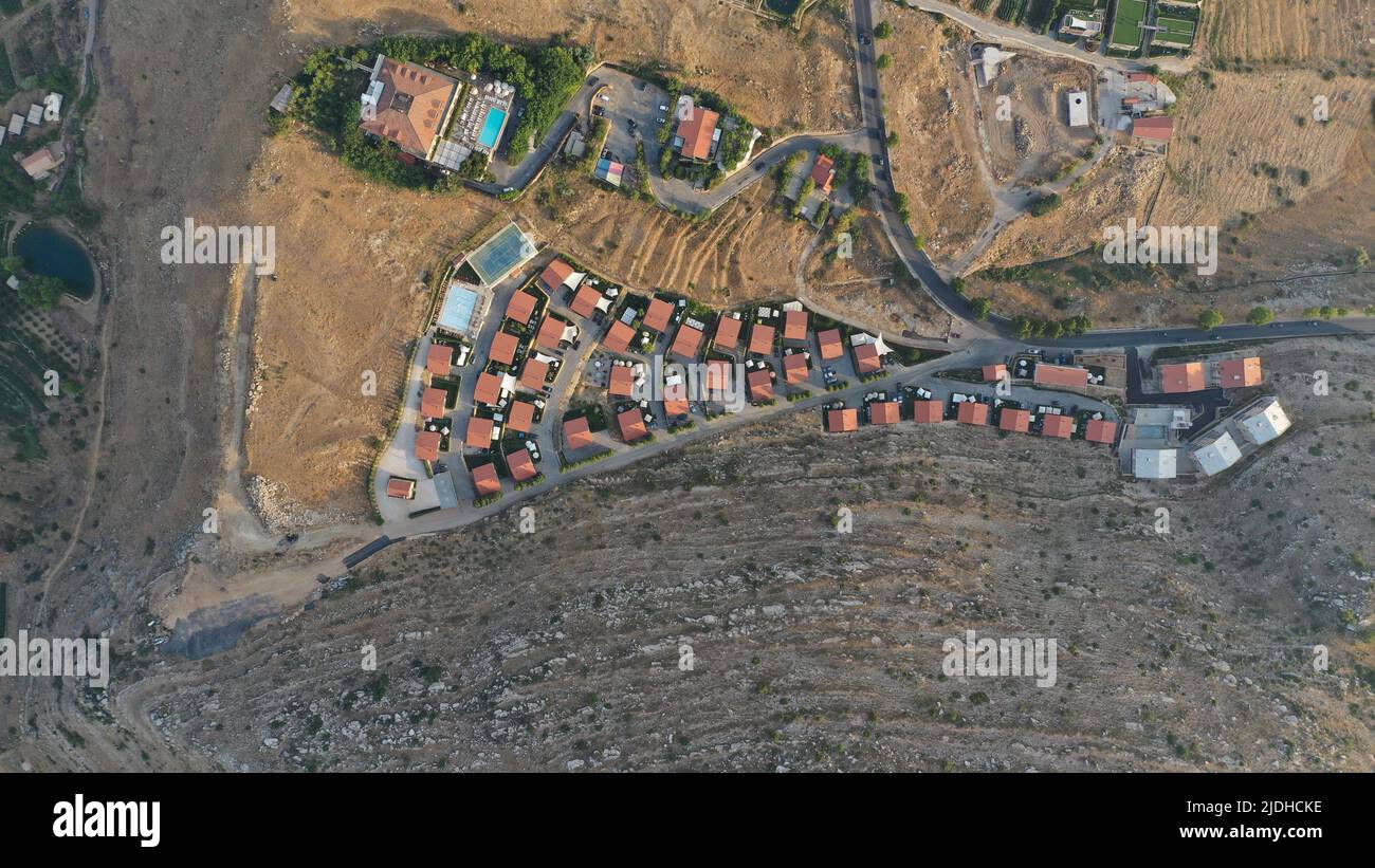 Faraya village with neighborhood in semi-desert, Mount Lebanon, Middle East, houses with red roofs Stock Photo